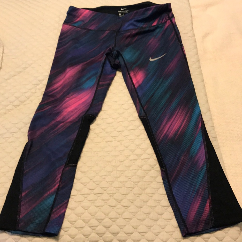 Nike women’s Dri-Fit multi-colored leggings size M